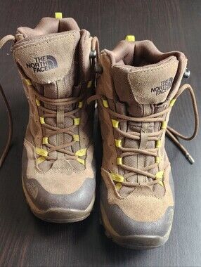 The North Face women’s waterproof  Brown Hiking Boots with Yellow Accents